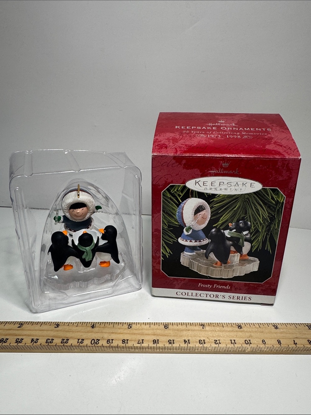 1998 Hallmark Frosty Friends Keepsake Ornament an Eskimo boy with penguins